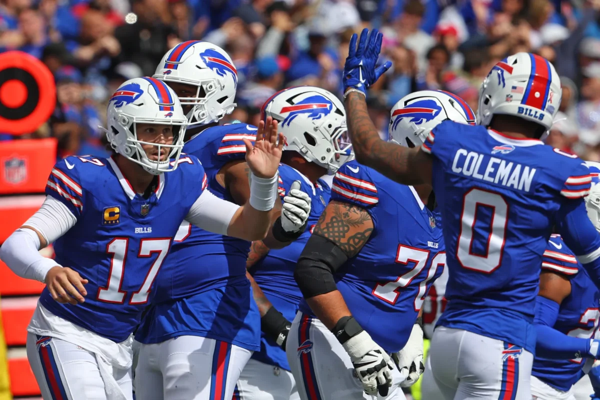 ORCHARD PARK, NEW YORK – SEPTEMBER 08: Josh Allen #17 of the Buffalo Bills celebrates with Keon Coleman #0 of the Buffalo Bills after Allen’s rushing touchdown during the second quarter against the Arizona Cardinals at Highmark Stadium on September 08, 2024, in Orchard Park, New York. (Photo by Timothy T Ludwig/Getty Images)
