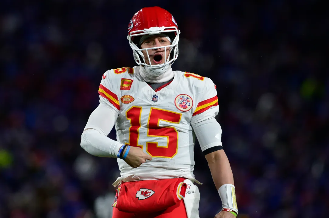 Kansas City QB Patrick Mahomes celebrates after throwing a game tying TD.