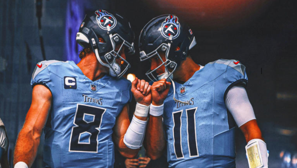 Will Levis and Mason Rudolph fist bumping pre-game.